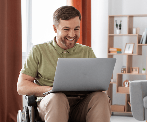 Founding member working on a laptop